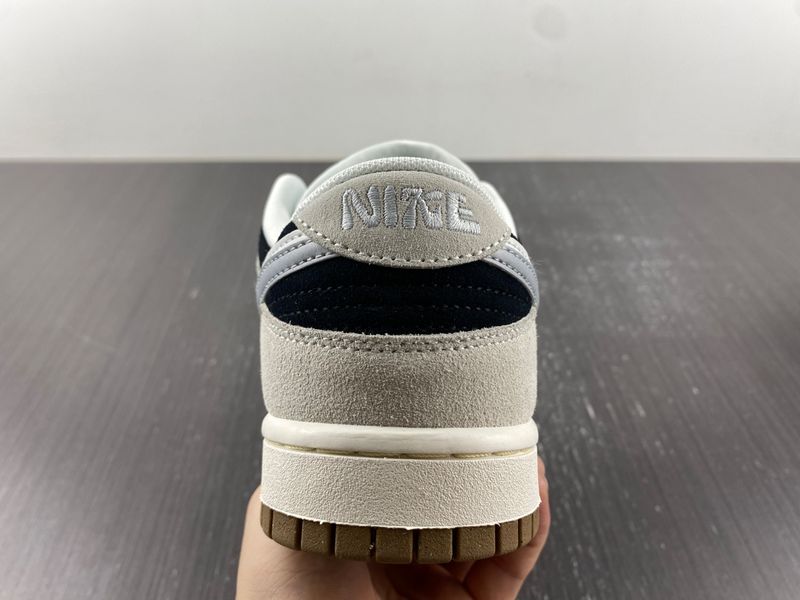 Dunk Low Stencil Swoosh DO9457-100